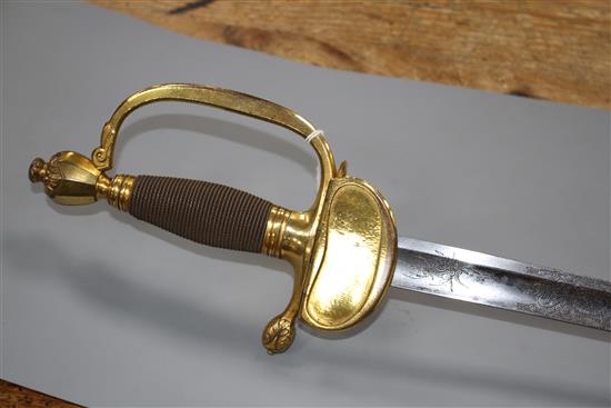 A Georgian infantry officers sword, fine gilt hilt, folding guard, the blade etched GR and Royal Arms, blade 82.5cm, overall length 99